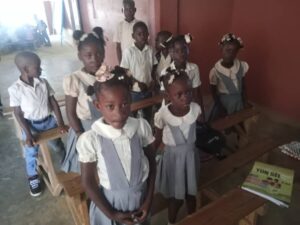Students participating in education and nutrition programs in Haiti – Silem Foundation